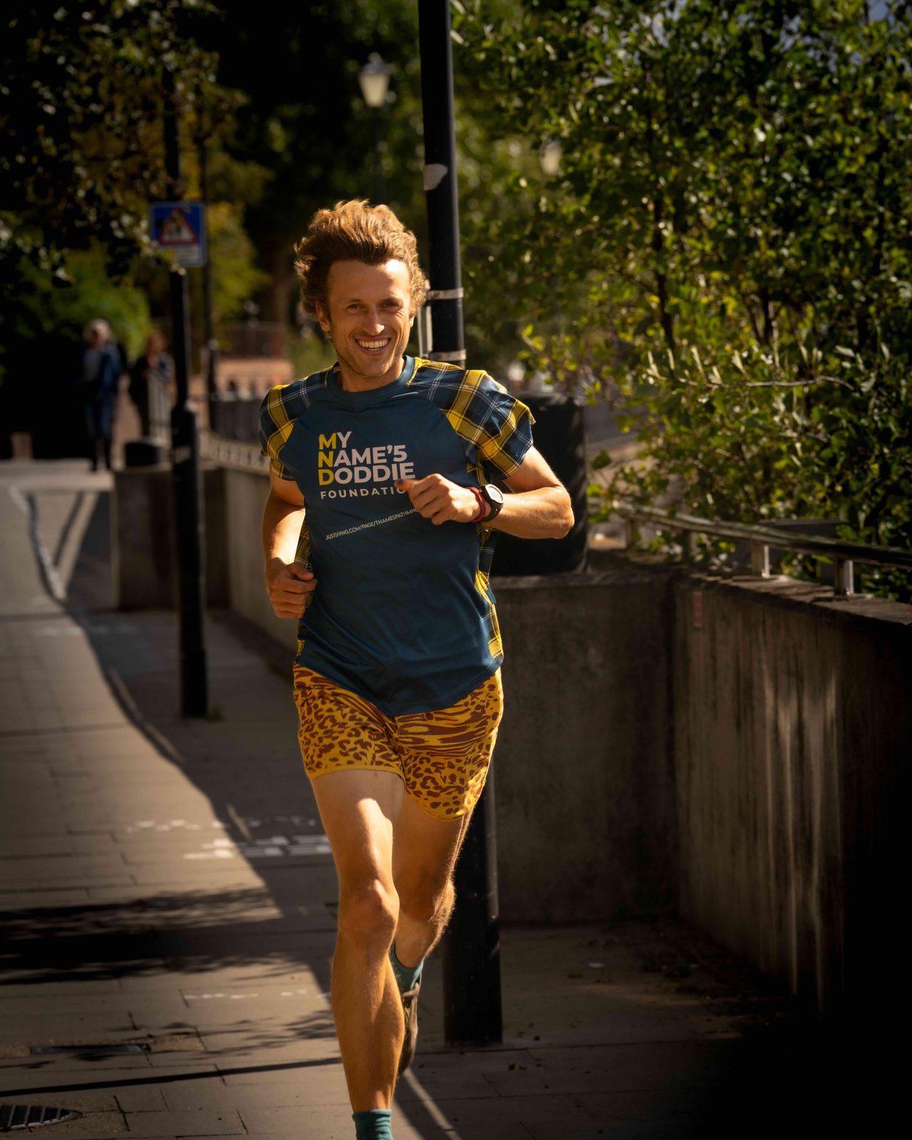 Tom running along the Thames Path